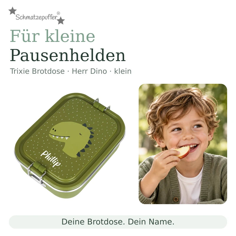 Trixie Brotdose Herr Dino klein mit dem Namen Phillip neben einem Kind bei der Snackpause